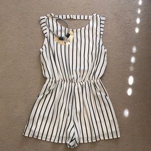Black and white striped romper Size: M